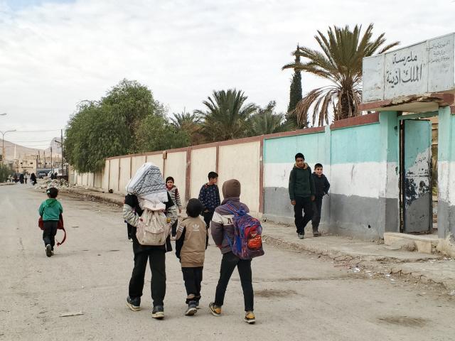 (251216) -- PALMYRA, Dec. 16, 2025 (Xinhua) -- People walk along a street in Palmyra, central Syria, Dec. 14, 2025. TO GO WITH "Feature: Residents in Syria's Palmyra recall tense hours after attack kills U.S. service members" (Str/Xinhua)
