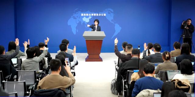 (251217) -- BEIJING, Dec. 17, 2025 (Xinhua) -- Zhu Fenglian, spokesperson for the State Council Taiwan Affairs Office, gestures at a press conference in Beijing, capital of China, Dec. 17, 2025. (Xinhua/Pan Xu)