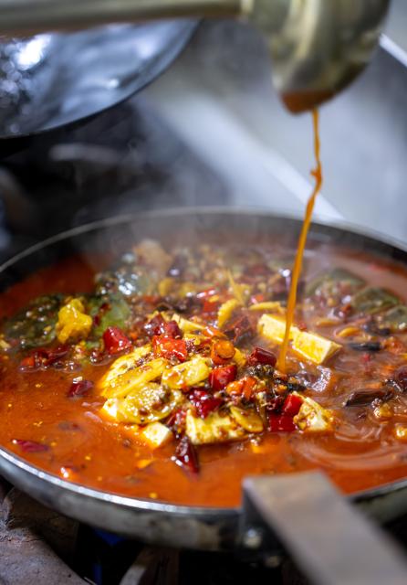 (251217) -- GUANGYUAN, Dec. 17, 2025 (Xinhua) -- A chef prepares tofu banquet at a restaurant in Jian'ge County of Guangyuan City, southwest China's Sichuan Province, Dec. 13, 2025.
  Guangyuan, in northern Sichuan Province, run through by the Jialing River and its tributaries, nurtures unique cuisines with its pure water. Across its streets and alleys, bowls of freshly steamed and sliced cold noodles attract people from day and night. Thanks to the ingredients, the cold noodles boast robust flavor of rice.  
  In Jian'ge County under Guangyuan City, Jianmen tofu, a local renowned dish, also made from this pure water with local soybeans, has gained its popularity among local residents as well as tourists. Chefs here also have created various cooking recipes for tofu to express their love for this simple raw material.
  Cooked with traditional skills, local dishes in Guangyuan preserve the original flavor of food materials and evoke the nostalgia for people working away from home. (Xinhua/Lian Zhen)