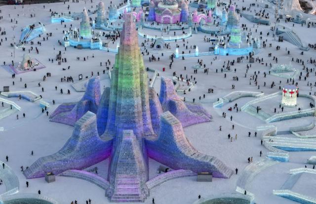 (251217) -- HARBIN, Dec. 17, 2025 (Xinhua) -- An aerial drone photo taken on Dec. 17, 2025 shows the ice sculptures at the Harbin Ice-Snow World in Harbin, northeast China's Heilongjiang Province. The Harbin Ice-Snow World, world's largest ice and snow theme park, officially opened for the season on Wednesday, unveiling its most spectacular edition yet, featuring landmark attractions, thoughtful services and magnificent ice sculptures across a record 1.2 million square meters of park area. (Xinhua/Wang Song)