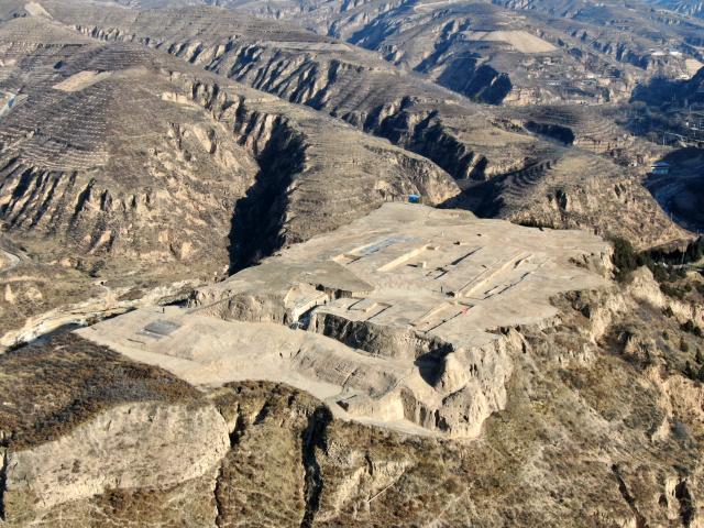(251218) -- BEIJING, Dec. 18, 2025 (Xinhua) -- An aerial drone photo taken on Dec. 9, 2025 shows part of the Zhaigou site in Qingjian County, northwest China's Shaanxi Province. The Zhaigou site, a settlement site dating back to about 3,200 years ago, was listed as one of the major field archaeological discoveries during the sixth Shanghai Archaeology Forum (SAF2025) in east China's Shanghai on Tuesday. (Xinhua/Li Yibo)