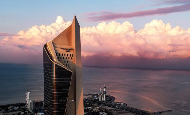 (251218) -- KUWAIT CITY, Dec. 18, 2025 (Xinhua) -- A drone photo taken on Dec. 17, 2025 shows a city view with clouds rolling over Kuwait City, Kuwait. (Photo by Asad/Xinhua)