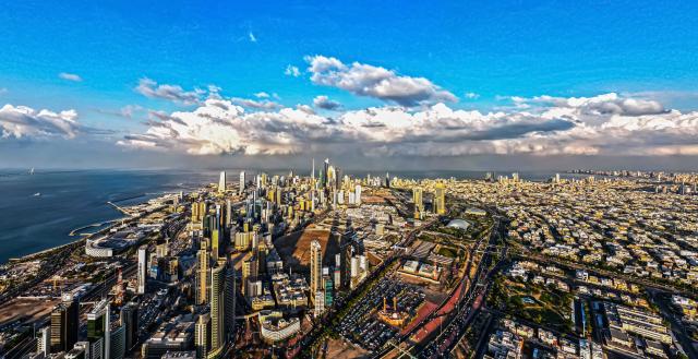 (251218) -- KUWAIT CITY, Dec. 18, 2025 (Xinhua) -- An aerial drone photo taken on Dec. 17, 2025 shows a city view with clouds rolling over Kuwait City, Kuwait. (Photo by Asad/Xinhua)
