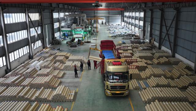 (251218) -- GUANGYUAN, Dec. 18, 2025 (Xinhua) -- A drone photo taken on Dec. 12, 2025 shows workers working at a roll flooring manufacturing workshop in Guangyuan, southwest China's Sichuan Province. The home furnishing industry of Guangyuan stands out for its high quality, and its roll flooring products sell well across China and overseas.  
  In Tashkent, the capital of Uzbekistan, a building supplies store that sells flooring products from Guangyuan is doing brisk business. Jamshid Tashpulatov, the owner of the store, hopes to cooperate with more Chinese companies as the business keeps growing.
  Historically a key stop connecting China with other countries, Guangyuan is now emerging as a new landmark for western China's opening up. (Xinhua/Chen Zhenhai)
