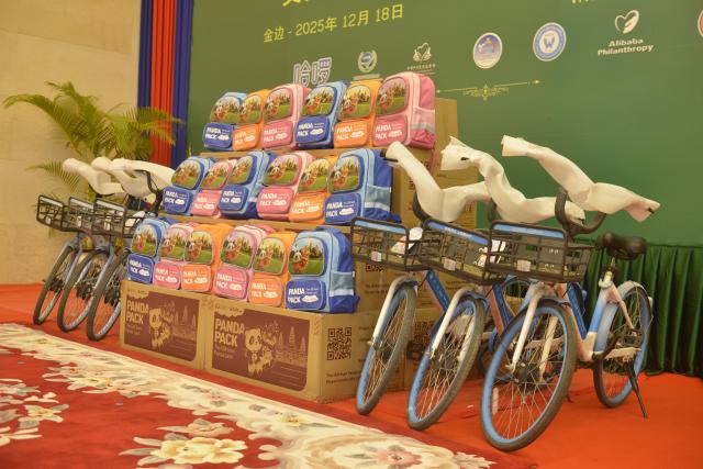 (251218) -- PHNOM PENH, Dec. 18, 2025 (Xinhua) -- This photo taken on Dec. 18, 2025 shows part of donated bicycles and Panda packs at a handover ceremony in Phnom Penh, Cambodia. The China Foundation for Rural Development (CFRD) on Thursday donated 2,500 bicycles and 21,600 Panda packs to Cambodian schools for distribution to underprivileged students.
   The CFRD, through its local partner Civil Society Alliance Forum, handed over the donation to beneficiary schools at a ceremony in the capital city of Phnom Penh in the presence of Cambodian Permanent Deputy Prime Minister and Cabinet Minister Vongsey Vissoth and Chinese Ambassador to Cambodia Wang Wenbin.
   Speaking at the event, Vissoth said underprivileged students in 128 schools in Phnom Penh and 12 other provinces would benefit from this donation. (Photo by Phearum/Xinhua)