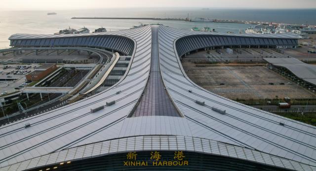 (251218) -- HAIKOU, Dec. 18, 2025 (Xinhua) -- An aerial drone photo taken on Dec. 18, 2025 shows part of the Xinhai Harbour in Haikou, south China's Hainan Province. China on Thursday launched island-wide special customs operations in the Hainan Free Trade Port (FTP). (Xinhua/Yang Guanyu)