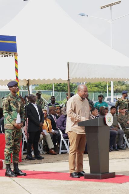 (251218) -- ACCRA, Dec. 18, 2025 (Xinhua) -- Ghanaian President John Dramani Mahama (R, front) delivers a speech during an event marking the dispatch of a Ghanaian contingent of soldiers to Jamaica to support reconstruction and relief work at Kotoka International Airport in Accra, Ghana on Dec. 17, 2025. TO GO WITH "Ghanaian president vows to support Jamaica's post-hurricane construction" (Str/Xinhua)