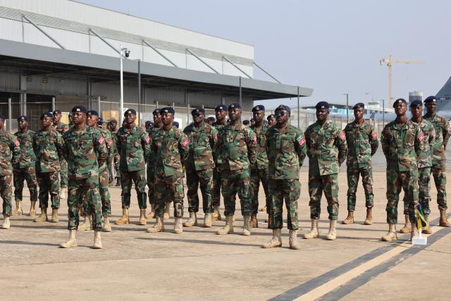 (251218) -- ACCRA, Dec. 18, 2025 (Xinhua) -- Ghanaian soldiers prepare for the dispatch to aid Jamaica's post-hurricane reconstruction at Kotoka International Airport in Accra, Ghana on Dec. 17, 2025. TO GO WITH "Ghanaian president vows to support Jamaica's post-hurricane construction" (Photo by Prince Moses Sabah/Xinhua)