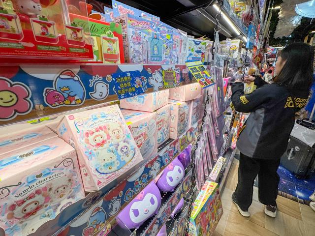 (251219) -- GUANGZHOU, Dec. 19, 2025 (Xinhua) -- This photo shows Sanrio-themed blind boxes made by Guangzhou Moetch Cultural & Creative Co., Ltd. at a Don Don Donki store in Macao, south China, Dec. 14, 2025.
  China is one of the world's largest markets and production bases for trendy toys. "Trendy toys," ranging from blind boxes to IP-themed merchandise, have emerged as a niche but fast-growing segment, reflecting the rise of emotion-driven consumption in the country.
  No longer just a manufacturing hub, China is also emerging as a source of original cultural exports and designed-in-China trendy toys are gaining international popularity. 
  Since 2024, a series of Chinese cultural and creative products have become breakout hits and trending topics online. Some well-known IPs, such as Labubu, Nezha, and Wukong, have raised waves of consumption craze through films, games, and various cultural derivatives.
  The country's designer toy market, valued at roughly 60 billion yuan (about 8.52 billion U.S. dollars) in 2023, is projected to reach 110.1 billion yuan by 2026, with annual growth rate exceeding 20 percent. (Xinhua/Mao Siqian)