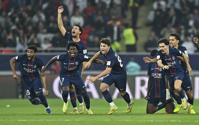 (251219) -- BEIJING, Dec. 19, 2025 (Xinhua) -- Players of Paris Saint-Germain (PSG) celebrate as they win the FIFA Intercontinental Cup 2025 final match between France's Paris Saint-Germain (PSG) and Brazil's CR Flamengo in Al Rayyan, Qatar, on Dec. 17, 2025. (Photo by Nikku/Xinhua)