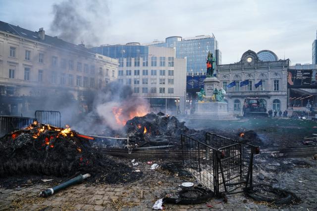 (251219) -- BEIJING, Dec. 19, 2025 (Xinhua) -- This photo taken on Dec. 18, 2025 shows a view after a farmers' protest in Brussels, Belgium. Thousands of farmers from across Europe rallied near the European Parliament and the Europa Building in Brussels on Thursday as European Union (EU) leaders convened for a summit, with a long-negotiated trade deal with the South American bloc Mercosur on the agenda. (Xinhua/Peng Ziyang)