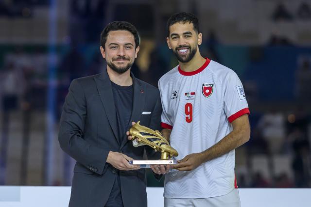 (251219) -- LUSAIL, Dec. 19, 2025 (Xinhua) -- Ali Olwan (R) of Jordan receives the Golden Boot Award from Al Hussein bin Abdullah II, Crown Prince of Jordan after the FIFA Arab Cup 2025 final match between Jordan and Morocco at Lusail Stadium in Lusail, Qatar, on Dec. 18, 2025. (Photo by Nikku/Xinhua)