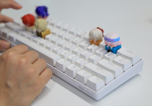 (251219) -- GUANGZHOU, Dec. 19, 2025 (Xinhua) -- This photo shows keyboard decorations at the headquarters of All For Play, a trendy toy brand, in Guangzhou, south China's Guangdong Province, Oct. 28, 2025.
  China is one of the world's largest markets and production bases for trendy toys. "Trendy toys," ranging from blind boxes to IP-themed merchandise, have emerged as a niche but fast-growing segment, reflecting the rise of emotion-driven consumption in the country.
   No longer just a manufacturing hub, China is also emerging as a source of original cultural exports and designed-in-China trendy toys are gaining international popularity. 
   Since 2024, a series of Chinese cultural and creative products have become breakout hits and trending topics online. Some well-known IPs, such as Labubu, Nezha, and Wukong, have raised waves of consumption craze through films, games, and various cultural derivatives.
   The country's designer toy market, valued at roughly 60 billion yuan (about 8.52 billion U.S. dollars) in 2023, is projected to reach 110.1 billion yuan by 2026, with annual growth rate exceeding 20 percent. (Xinhua/Huo Siying)