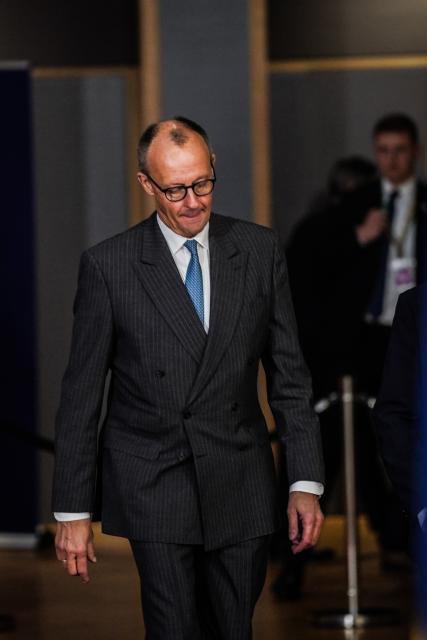 (251219) -- BRUSSELS, Dec. 19, 2025 (Xinhua) -- German Chancellor Friedrich Merz enters the venue of a European Council summit in Brussels, Belgium, Dec. 18, 2025. The European Council on Friday approved a 90-billion-euro (about 105.4 billion U.S. dollars) loan package to support Ukraine's military and economic needs over the next two years.
   According to a European Council statement, the loan will be financed through European Union borrowing on the capital markets and backed by the EU budget "headroom," the unused margin in the budget that can be mobilized as a guarantee to support EU borrowing. (Xinhua/Peng Ziyang)