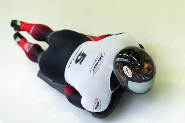 (251220) -- SIGULDA, Dec. 20, 2025 (Xinhua) -- Lin Qinwei of China competes during the Men's Skeleton heat at the IBSF World Cup Bobsleigh and Skeleton in Sigulda, Latvia, Dec. 19, 2025. (Photo by Edijs Palens/Xinhua)