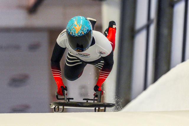 (251220) -- SIGULDA, Dec. 20, 2025 (Xinhua) -- Zhao Dan of China competes during the Women's Skeleton heat at the IBSF World Cup Bobsleigh and Skeleton in Sigulda, Latvia, Dec. 19, 2025. (Photo by Edijs Palens/Xinhua)