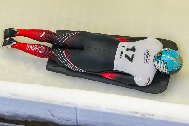 (251220) -- SIGULDA, Dec. 20, 2025 (Xinhua) -- Zhao Dan of China competes during the Women's Skeleton heat at the IBSF World Cup Bobsleigh and Skeleton in Sigulda, Latvia, Dec. 19, 2025. (Photo by Edijs Palens/Xinhua)