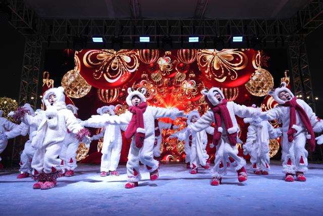 (251220) -- ASTANA, Dec. 20, 2025 (Xinhua) -- A performance is staged in Astana, Kazakhstan, Dec. 19, 2025. A New Year tree lighting ceremony was held in Astana on Friday, with more than 40 large New Year trees lit up across the city. The ceremony was accompanied by a citywide "fairy-tale fest" featuring concerts, dance performances and fireworks. (Photo by Kalizhan Ospanov/Xinhua)