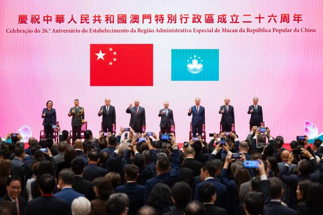 (251220) -- MACAO, Dec. 20, 2025 (Xinhua) -- The Macao Special Administrative Region (SAR) government holds a reception to celebrate the 26th anniversary of its return to the motherland, in Macao, south China, Dec. 20, 2025. (Xinhua/Cheong Kam Ka)
