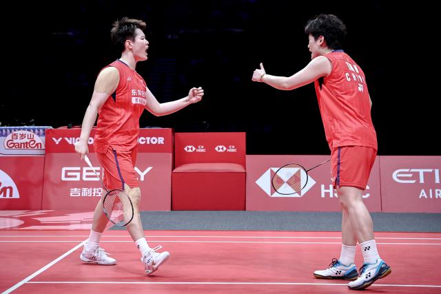 (251220) -- HANGZHOU, Dec. 20, 2025 (Xinhua) -- Liu Shengshu/Tan Ning (R) of China celebrate during the women's doubles semifinal match between Liu Shengshu/Tan Ning of China and Baek Ha Na/Lee So Hee of South Korea at BWF World Tour Finals 2025 in Hangzhou, east China's Zhejiang Province, Dec. 20, 2025. (Xinhua/Jiang Han)