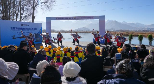 (251220) -- LHASA, Dec. 20, 2025 (Xinhua) -- A performance is staged at a certification ceremony for the Lhalu Wetland National Nature Reserve in Lhasa, southwest China's Xizang Autonomous Region, Dec. 20, 2025. Verified by the World Record Certification Agency (WRCA), the Lhalu Wetland National Nature Reserve has been confirmed as the "highest altitude natural urban wetland." The certification ceremony was held at the wetland on Saturday.
   Located in the urban area of Lhasa, the wetland covers an area of 12.2 square kilometers at an average altitude of 3,649 meters. (Xinhua/Jigme Dorje)