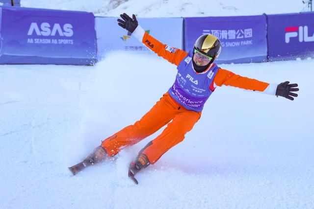 (251221) -- ZHANGJIAKOU, Dec. 21, 2025 (Xinhua) -- Qi Guangpu of China competes during the men's freeski aerials final of FIS Freeski World Cup 2025 in Zhangjiakou, north China's Hebei Province, Dec. 20, 2025. (Photo by Wu Diansen/Xinhua)