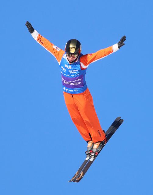 (251221) -- ZHANGJIAKOU, Dec. 21, 2025 (Xinhua) -- Qi Guangpu of China competes during the men's freeski aerials final of FIS Freeski World Cup 2025 in Zhangjiakou, north China's Hebei Province, Dec. 20, 2025. (Photo by Wu Diansen/Xinhua)