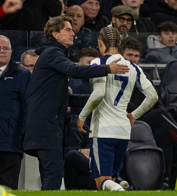 (251221) -- LONDON, Dec. 21, 2025 (Xinhua) -- Tottenham Hotspur's Xavi Simons (R) walks past head coach Thomas Frank after being shown a red card and sent off during the English Premier League match between Tottenham Hotspur FC and Liverpool FC at the Tottenham Hotspur Stadium in London, Britain, on Dec. 20, 2025.
FOR EDITORIAL USE ONLY. NOT FOR SALE FOR MARKETING OR ADVERTISING CAMPAIGNS. NO USE WITH UNAUTHORIZED AUDIO, VIDEO, DATA, FIXTURE LISTS, CLUB/LEAGUE LOGOS OR "LIVE" SERVICES. ONLINE IN-MATCH USE LIMITED TO 45 IMAGES, NO VIDEO EMULATION. NO USE IN BETTING, GAMES OR SINGLE CLUB/LEAGUE/PLAYER PUBLICATIONS. (Xinhua)