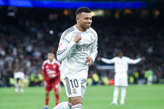 (251221) -- MADRID, Dec. 21, 2025 (Xinhua) -- Real Madrid's Kylian Mbappe celebrates a goal during a La Liga football match between Real Madrid and Sevilla FC at Santiago Bernabeu stadium in Madrid, Spain, on Dec. 20, 2025. (Photo by Gustavo Valiente/Xinhua)