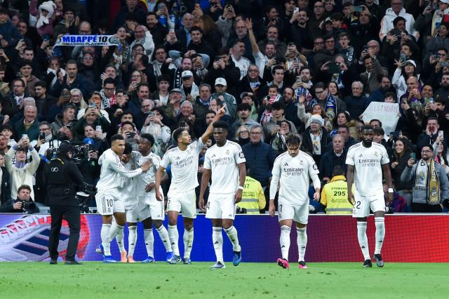 (251221) -- MADRID, Dec. 21, 2025 (Xinhua) -- Players of Real Madrid celebrate a goal during a La Liga football match between Real Madrid and Sevilla FC at Santiago Bernabeu stadium in Madrid, Spain, on Dec. 20, 2025. (Photo by Gustavo Valiente/Xinhua)