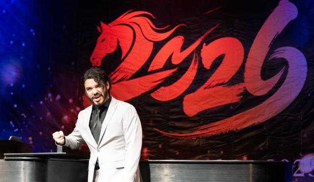 (251221) -- MEXICO CITY, Dec. 21, 2025 (Xinhua) -- A musician performs at a New Year concert in Mexico City, the capital of Mexico, on Dec. 20, 2025. The concert featuring both traditional Chinese music and works from the global repertoire was open to the public free of charge. (Xinhua/Li Mengxin)