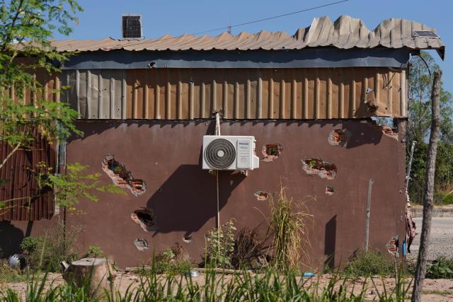 (251221) -- ODDAR MEANCHEY, Dec. 21, 2025 (Xinhua) -- A civilian house damaged by Thailand's artillery shelling is seen in Oddar Meanchey province, Cambodia, Dec. 20, 2025. The civilian death toll in Cambodia has increased to 19, as the renewed border conflict with Thailand has entered its 15th day, according to Cambodia's defense ministry. (Agence Kampuchea Presse/Handout via Xinhua)