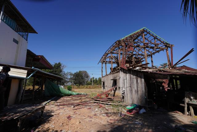 (251221) -- ODDAR MEANCHEY, Dec. 21, 2025 (Xinhua) -- A civilian house damaged by Thailand's artillery shelling is seen in Oddar Meanchey province, Cambodia, Dec. 19, 2025. The civilian death toll in Cambodia has increased to 19, as the renewed border conflict with Thailand has entered its 15th day, according to Cambodia's defense ministry. (Agence Kampuchea Presse/Handout via Xinhua)