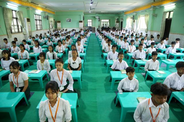 (251221) -- YANGON, Dec. 21, 2025 (Xinhua) -- Students attend a meditation course at a post-primary monastic school in Yangon, Myanmar, Dec. 11, 2025. TO GO WITH "Feature: More than study aid: Meditation takes root as way of life for Myanmar children" (Xinhua/Myo Kyaw Soe)