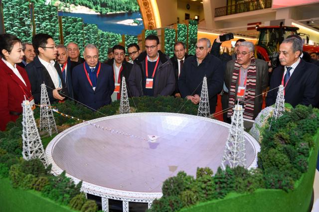 (251221) -- BEIJING, Dec. 21, 2025 (Xinhua) -- Representatives of attendees of the Communist Party of China (CPC) in Dialogue with World Political Parties High-Level Meeting visit an exhibition on China's achievements in Beijing, capital of China, Dec. 1, 2017. (Xinhua/Chen Yehua)