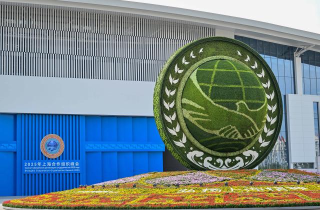 (251221) -- BEIJING, Dec. 21, 2025 (Xinhua) -- This photo taken on Aug. 30, 2025 shows an exterior view of the main venue of the Shanghai Cooperation Organization (SCO) Summit 2025 in north China's Tianjin. (Xinhua/Sun Fanyue)