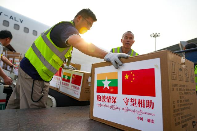 (251221) -- BEIJING, Dec. 21, 2025 (Xinhua) -- Staff members load donated medical supplies onto a plane at Dehong Mangshi Airport in Mangshi City, Dehong Dai and Jingpo Autonomous Prefecture, southwest China's Yunnan Province, April 1, 2025. (Xinhua/Chen Xinbo)