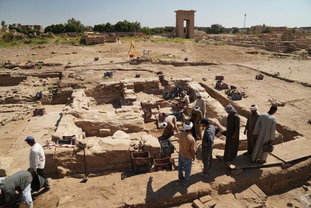 (251221) -- BEIJING, Dec. 21, 2025 (Xinhua) -- Archaeologists of a Chinese-Egyptian archaeological mission excavate the fourth chapel near the relic of the Montu Temple in Luxor, Egypt, on May 7, 2024. (Egyptian-Chinese archaeological mission/Handout via Xinhua)