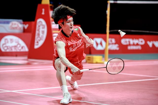 (251221) -- HANGZHOU, Dec. 21, 2025 (Xinhua) -- Wang Zhiyi of China hits a return during the women's singles final between Wang Zhiyi of China and An Se Young of South Korea at BWF World Tour Finals 2025 in Hangzhou, east China's Zhejiang Province, Dec. 21, 2025. (Xinhua/Jiang Han)