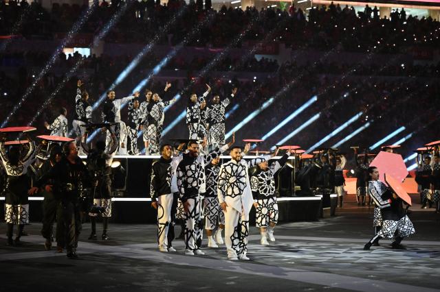 (251222) -- RABAT, Dec. 22, 2025 (Xinhua) -- Artists perform during the opening ceremony ahead of the opening match of the Africa Cup of Nations 2025 between Morocco and Comoros in Rabat, Morocco, Dec. 21, 2025. (Photo by Aissa/Xinhua)