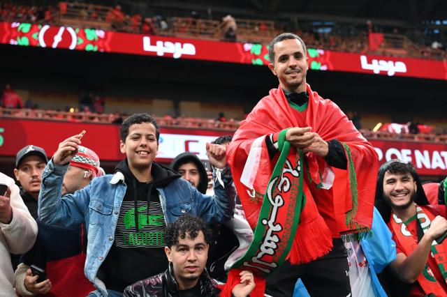 (251222) -- RABAT, Dec. 22, 2025 (Xinhua) -- Fans of Morocco react ahead of the opening match of the Africa Cup of Nations 2025 between Morocco and Comoros in Rabat, Morocco, Dec. 21, 2025. (Photo by Aissa/Xinhua)