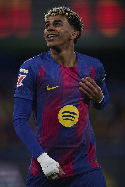 (251222) -- VILA-REAL, Dec. 22, 2025 (Xinhua) -- Lamine Yamal of Barcelona celebrates a goal during the La Liga football match between Villarreal and Barcelona in Vila-Real, Spain, Dec. 21, 2025. (Str/Xinhua)