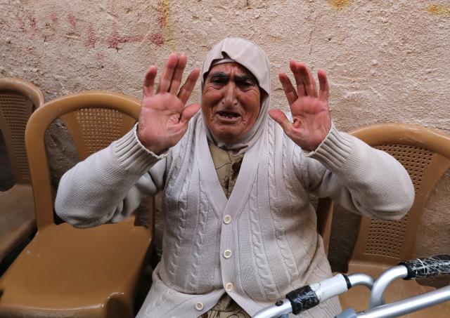 (251222) -- JENIN, Dec. 22, 2025 (Xinhua) -- A Palestinian mourns during the funeral of a 22-year-old man, Ahmed Said Zayoud, in the town of Silat al-Harithiya, northwest of the West Bank city of Jenin, Dec. 21, 2025. Two Palestinians were killed by Israeli forces in separate incidents in the northern West Bank on Saturday, the Palestinian Ministry of Health said.
   According to the ministry in Ramallah, a 16-year-old, Rayan Mohammed Abdel Qader Abu Mualla, was killed in Qabatiya. His body is being withheld by Israeli forces, the statement added. Earlier, a 22-year-old man, Ahmed Said Zayoud, was shot dead in Silat al-Harithiya, northwest of Jenin. (Photo by Nidal Eshtayeh/Xinhua)