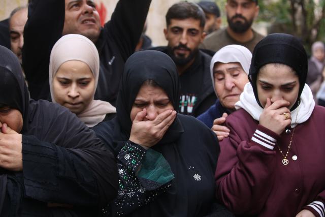 (251222) -- JENIN, Dec. 22, 2025 (Xinhua) -- Palestinians mourn during the funeral of a 22-year-old man, Ahmed Said Zayoud, in the town of Silat al-Harithiya, northwest of the West Bank city of Jenin, Dec. 21, 2025. Two Palestinians were killed by Israeli forces in separate incidents in the northern West Bank on Saturday, the Palestinian Ministry of Health said.
   According to the ministry in Ramallah, a 16-year-old, Rayan Mohammed Abdel Qader Abu Mualla, was killed in Qabatiya. His body is being withheld by Israeli forces, the statement added. Earlier, a 22-year-old man, Ahmed Said Zayoud, was shot dead in Silat al-Harithiya, northwest of Jenin. (Photo by Nidal Eshtayeh/Xinhua)