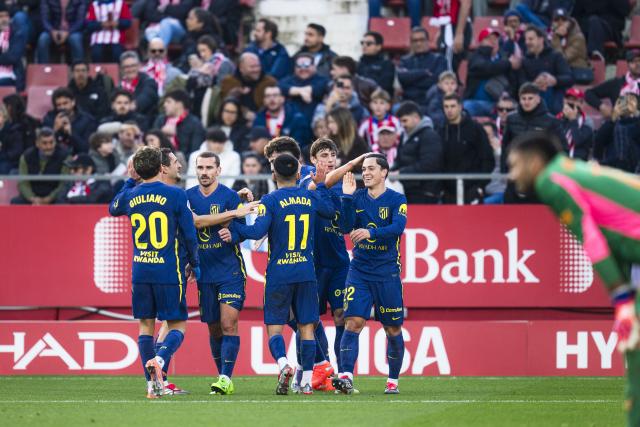 (251222) -- GIRONA, Dec. 22, 2025 (Xinhua) -- Players of Atletico de Madrid celebrate scoring during the La Liga football match between Girona FC and Atletico de Madrid in Montilivi Stadium, Girona, Spain, on Dec. 21, 2025. (Photo by Joan Gosa/Xinhua)