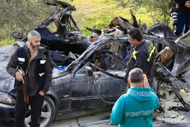 (251222) -- SIDON, Dec. 22, 2025 (Xinhua) -- This photo taken on Dec. 22, 2025 shows the site of an Israeli drone strike targeting a car on the Aaqtnait-Quneitra-Maamariyah road in the Sidon, Lebanon. Three people were killed Monday in an Israeli drone strike deep in southern Lebanon, according to Lebanese sources. (Photo by Ali Hashisho/Xinhua)