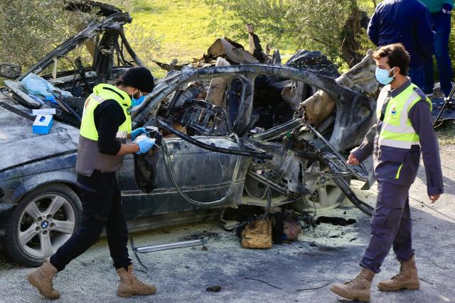 (251222) -- SIDON, Dec. 22, 2025 (Xinhua) -- This photo taken on Dec. 22, 2025 shows the site of an Israeli drone strike targeting a car on the Aaqtnait-Quneitra-Maamariyah road in the Sidon, Lebanon. Three people were killed Monday in an Israeli drone strike deep in southern Lebanon, according to Lebanese sources. (Photo by Ali Hashisho/Xinhua)