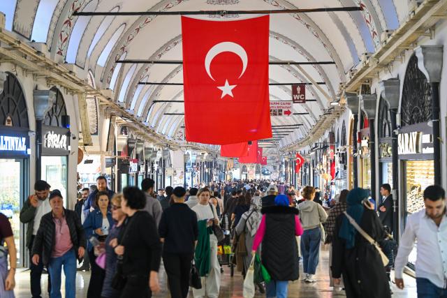 (251222) -- ISTANBUL, Dec. 22, 2025 (Xinhua) -- This file photo taken on Nov. 24, 2025 shows tourists visiting the Grand Bazaar in Istanbul, Türkiye. Foreign tourist arrivals in Türkiye reached 2.8 million in November, highlighting the country's sustained tourism growth, as the total number of foreign visitors reached 50.06 million in the first 11 months of the year, according to statistics released by the Ministry of Culture and Tourism on December 22. (Xinhua/Liu Lei)