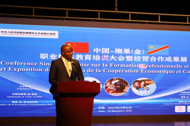(251222) -- KINSHASA, Dec. 22, 2025 (Xinhua) -- The Democratic Republic of the Congo (DRC) Minister of State and Minister of Vocational Training Marc Ekila Likombio addresses the Sino-Congolese conference on vocational and technical training in Kinshasa, DRC, on Dec. 22, 2025. The Sino-Congolese conference on vocational and technical training was held on Monday in Kinshasa, the capital of the DRC, aiming to strengthen bilateral cooperation. (Xinhua/Shi Yu)