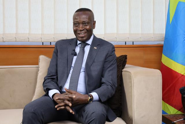 (251222) -- KINSHASA, Dec. 22, 2025 (Xinhua) -- Democratic Republic of the Congo (DRC) Vice Prime Minister and minister of national economy Daniel Mukoko Samba speaks during an interview in Kinshasa, capital of the DRC, on Dec. 18, 2025. TO GO WITH "Interview: Ties with China remain robust -- Vice PM" (Photo by Benoit Nyemba/Xinhua)